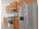 Well-equipped kitchen showcasing stainless steel appliances and ample cabinet space at 200 Palm Terrace Loop, Conway, SC 29526