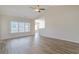 Bright living room with vaulted ceiling, ceiling fan, and hardwood floors at 200 Palm Terrace Loop, Conway, SC 29526