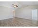 Bright living room with vaulted ceiling, ceiling fan, and hardwood floors at 200 Palm Terrace Loop, Conway, SC 29526