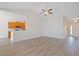 Open floor plan with bright living room flowing into the kitchen with bar seating at 200 Palm Terrace Loop, Conway, SC 29526