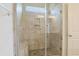 Bathroom shower featuring glass doors, bench seating, and tile surround at 200 Palm Terrace Loop, Conway, SC 29526