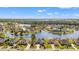 Panoramic aerial view of homes nestled around a picturesque lake within the community at 2039 Woodburn Dr., Myrtle Beach, SC 29579