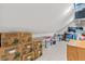 Finished attic space provides ample storage with boxes and shelving at 2039 Woodburn Dr., Myrtle Beach, SC 29579