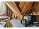 Unfinished attic space with exposed rafters offers potential for extra storage at 2039 Woodburn Dr., Myrtle Beach, SC 29579