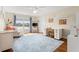 Inviting bedroom features a lovely waterfront view, and an area rug on hardwood floors at 2039 Woodburn Dr., Myrtle Beach, SC 29579