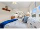 Bright bedroom with natural light, hardwood floors, and a scenic view of the water at 2039 Woodburn Dr., Myrtle Beach, SC 29579