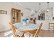 Cozy dining area adjacent to the kitchen featuring a round table, comfortable chairs, and beautiful views at 2039 Woodburn Dr., Myrtle Beach, SC 29579