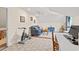 Comfortable living room features a recliner, a desk, and plush carpeting at 2039 Woodburn Dr., Myrtle Beach, SC 29579