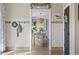 Dining room with light-colored table and chairs with Say Grace sign above the doorway at 205 Lander Dr., Conway, SC 29526