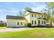 Exterior view of the home featuring a garage, well-manicured lawn, and charming architectural details at 205 Lander Dr., Conway, SC 29526