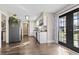 Bright kitchen featuring stainless steel appliances, wooden floors, and access to the back porch at 205 Lander Dr., Conway, SC 29526