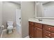Bathroom with tub and shower, vanity with sink, and toilet at 211 Oak Landing Dr., Conway, SC 29527