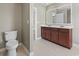 Bathroom featuring a toilet and double sink vanity at 211 Oak Landing Dr., Conway, SC 29527