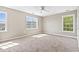 Bright bedroom with carpet and multiple windows at 211 Oak Landing Dr., Conway, SC 29527