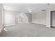 Spacious bonus room featuring neutral walls, plush carpet, ceiling fans, and natural light at 211 Oak Landing Dr., Conway, SC 29527
