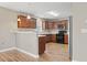 Well-appointed kitchen with breakfast bar, wood cabinets, and modern appliances at 211 Oak Landing Dr., Conway, SC 29527