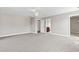 Large main bedroom boasts neutral walls, carpet, ceiling fan and attached ensuite bath at 211 Oak Landing Dr., Conway, SC 29527