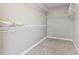 Spacious walk-in closet featuring built-in shelving for optimal storage at 211 Oak Landing Dr., Conway, SC 29527