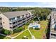 Aerial view showing the community amenities including a swimming pool, and beautifully landscaped grounds at 212 Maison Dr. # M 303, Myrtle Beach, SC 29572