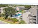 Birds-eye view showcasing the complex with a central pool area, beautifully landscaped grounds, and multiple buildings at 212 Maison Dr. # M 303, Myrtle Beach, SC 29572