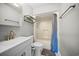 Modern bathroom showcases sleek vanity, toilet, and a shower-tub combo with showerhead at 212 Maison Dr. # M 303, Myrtle Beach, SC 29572