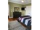 This bedroom features a dark wood dresser, carpet and ceiling fan at 234 Ave. Of The Palms, Myrtle Beach, SC 29579