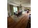 Dining room boasts a chandelier, a large window, and a dining table with chairs at 234 Ave. Of The Palms, Myrtle Beach, SC 29579