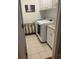 Laundry room with washer, dryer, sink, and storage at 234 Ave. Of The Palms, Myrtle Beach, SC 29579