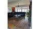 Bright and airy living room with large windows, comfortable leather furniture, and elegant décor at 234 Ave. Of The Palms, Myrtle Beach, SC 29579