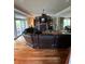 Spacious living room boasts wood floors, fireplace, and elegant seating arrangement at 234 Ave. Of The Palms, Myrtle Beach, SC 29579