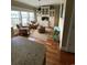 Inviting living room with large windows, chairs, and an area rug at 234 Ave. Of The Palms, Myrtle Beach, SC 29579