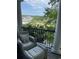 Scenic patio view overlooking lush greenery, lake, and neighborhood, providing a peaceful escape at 234 Ave. Of The Palms, Myrtle Beach, SC 29579