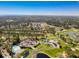 Expansive aerial view showcasing the golf course, trees, and other amenities near the ocean at 25 Bentley Ct., Pawleys Island, SC 29585