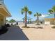 Inviting beach access with palm trees, nearby buildings and a covered gazebo at 25 Bentley Ct., Pawleys Island, SC 29585