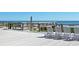 Relaxing beach deck with seating, an outdoor shower, and ocean views for residents at 25 Bentley Ct., Pawleys Island, SC 29585