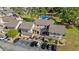 Aerial view of condo buildings showcases the pool and parking area at 3015 Old Bryan Dr. # 9-7, Myrtle Beach, SC 29577