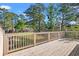 Spacious outdoor balcony with lush green landscaping and a view of other community condos at 3015 Old Bryan Dr. # 9-7, Myrtle Beach, SC 29577