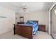 Comfortable bedroom with a queen bed, side tables, and sliding glass doors offers a peaceful retreat at 3015 Old Bryan Dr. # 9-7, Myrtle Beach, SC 29577
