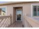 A cozy front entrance with a glass door, wooden floors, and stylish decor at 3015 Old Bryan Dr. # 9-7, Myrtle Beach, SC 29577
