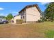 Exterior shows the side of the home, with a grassy lawn and small shrubs at 3015 Old Bryan Dr. # 9-7, Myrtle Beach, SC 29577
