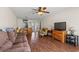 Open-concept living room and dining area, complete with wood floors and ample natural light at 3015 Old Bryan Dr. # 9-7, Myrtle Beach, SC 29577
