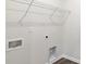 Functional laundry room with hookups and a wire shelf for storage at 316 Clear Lake Dr., Conway, SC 29526