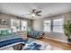 Bright bedroom with hardwood floors, two twin beds, and ample natural light from two large windows at 329 46Th Ave. N, North Myrtle Beach, SC 29582