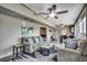 Open-concept living room with stylish decor, comfortable seating, and a seamless flow to the dining area at 329 46Th Ave. N, North Myrtle Beach, SC 29582