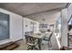 Under home area with an outdoor dining table and chairs, perfect for relaxing and entertaining at 329 46Th Ave. N, North Myrtle Beach, SC 29582