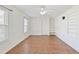 Neutral bedroom featuring new floors, white walls, ceiling fan, and closet space at 349 Robin Hood Circle, Little River, SC 29566