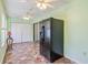 Eat-in dining area with black refrigerator and multiple ceiling fans at 349 Robin Hood Circle, Little River, SC 29566