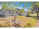 Quaint home featuring a yard with greenery, gravel, and a decorative bird bath at 349 Robin Hood Circle, Little River, SC 29566