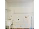 Unfinished laundry room with a utility sink and a bare white wall at 349 Robin Hood Circle, Little River, SC 29566