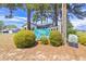 Bay Forest neighborhood entrance sign with manicured bushes and tall pine trees at 349 Robin Hood Circle, Little River, SC 29566